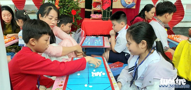 TP.HCM: Học sinh 6 quận， huyện cùng tìm hiểu về Tết cổ truyền thông qua trò chơi - Ảnh 5.